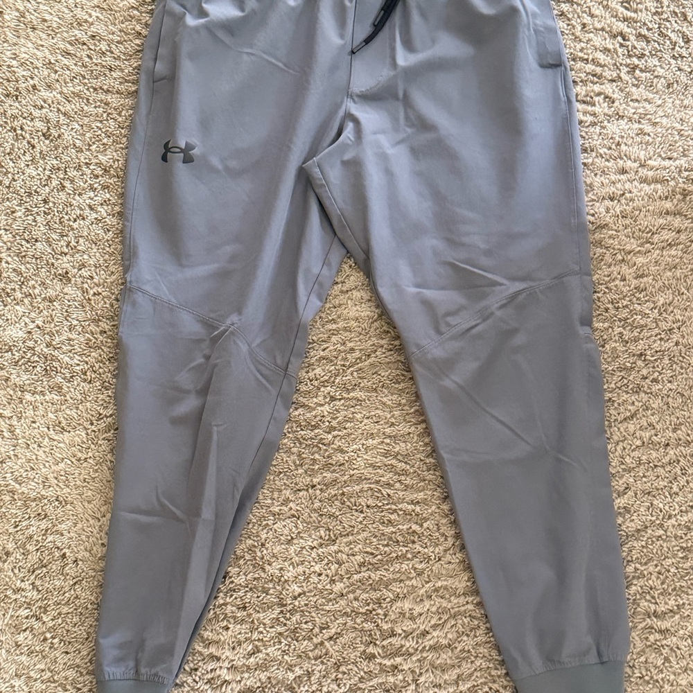 Under Armour Gray Sweatpants with Tapered Legs and Elastic Cuffs